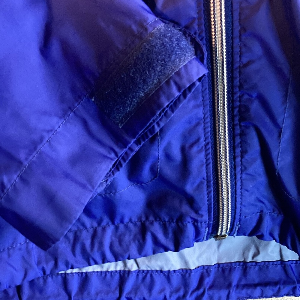 Columbia blue rain jacket with vent shoulder and hidden hood in collar. 126 - Picture 3 of 7